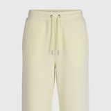 Light yellow sweatpants on a light gray background