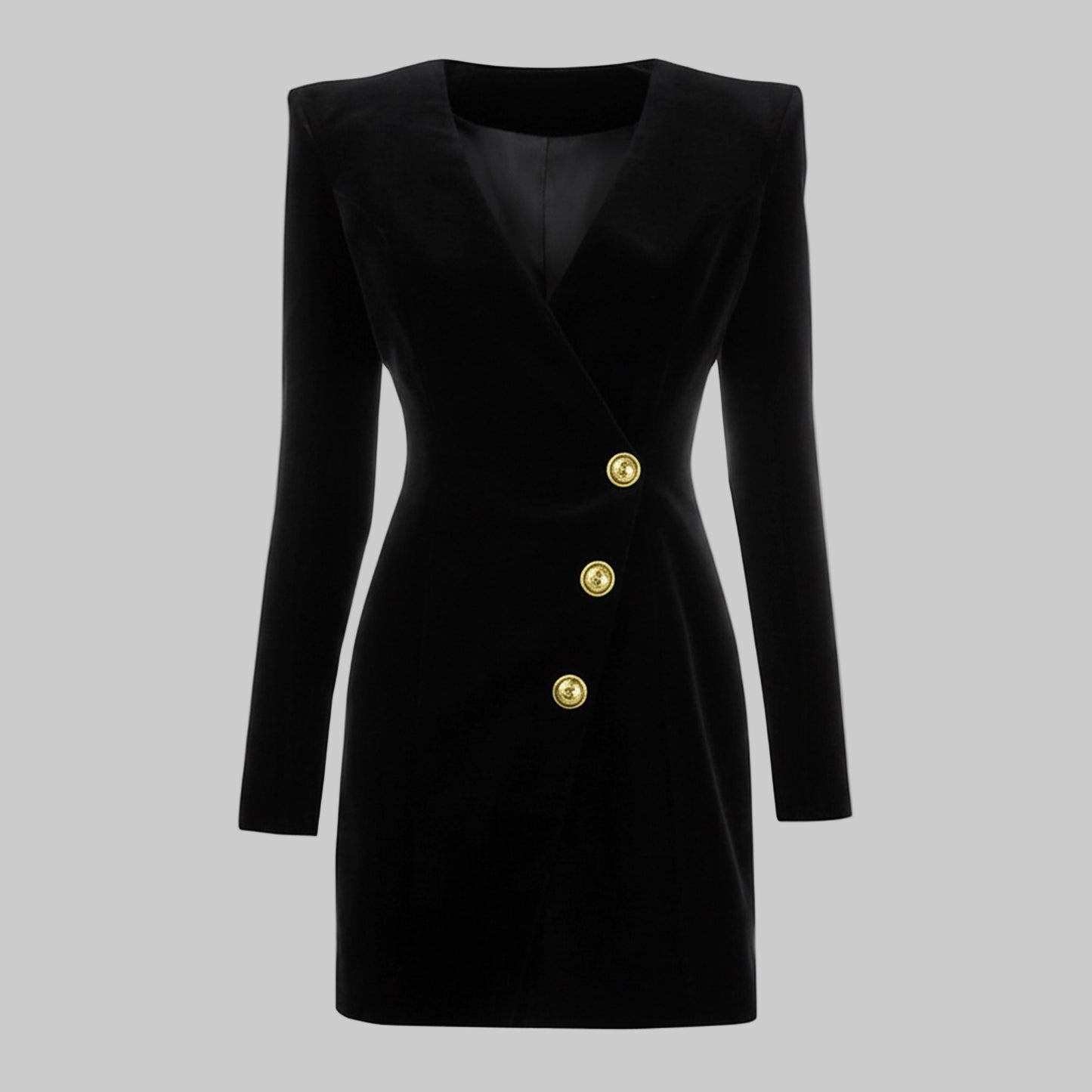 Black dress with gold buttons on a gray background
