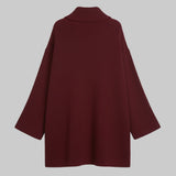 Maroon sweater on a white background