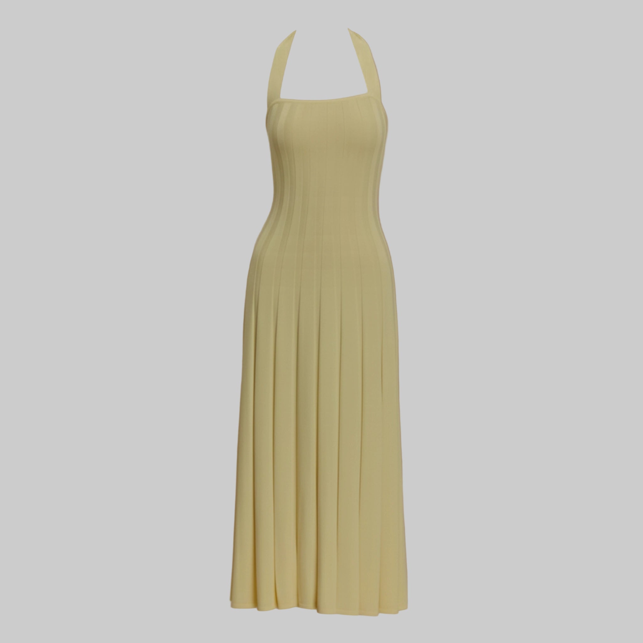 Beige halter neck dress on a light gray background