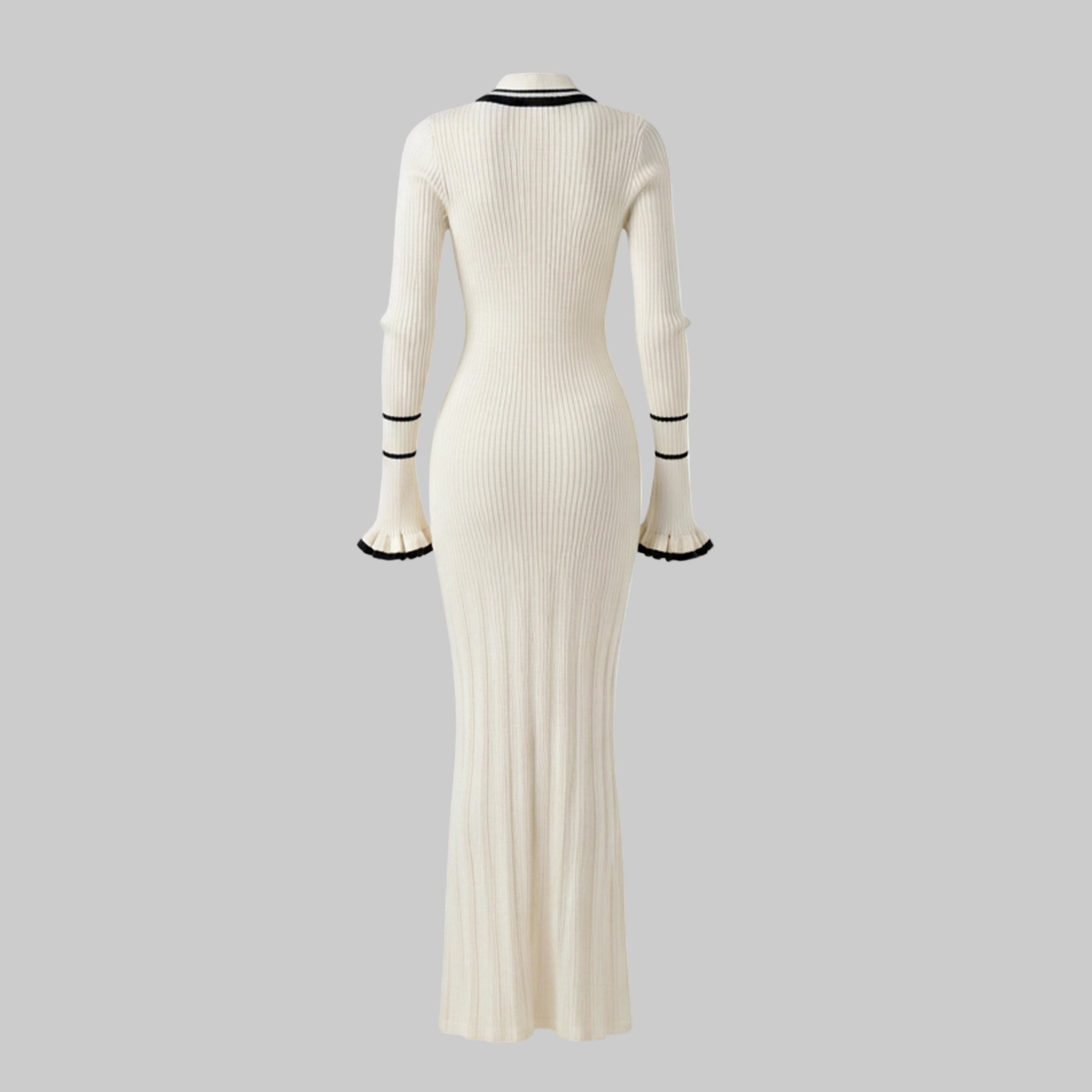 White ribbed dress with black trim on a white background