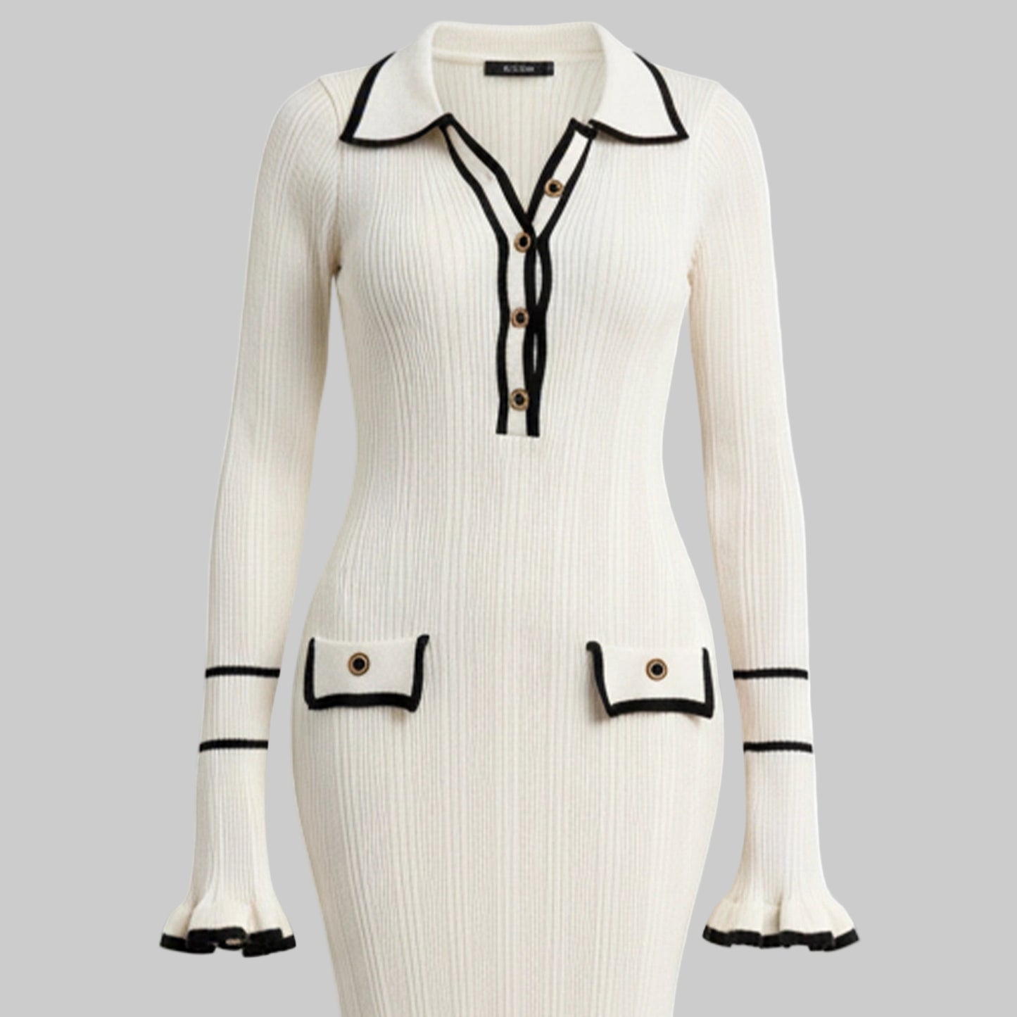 White ribbed dress with black accents on a white background