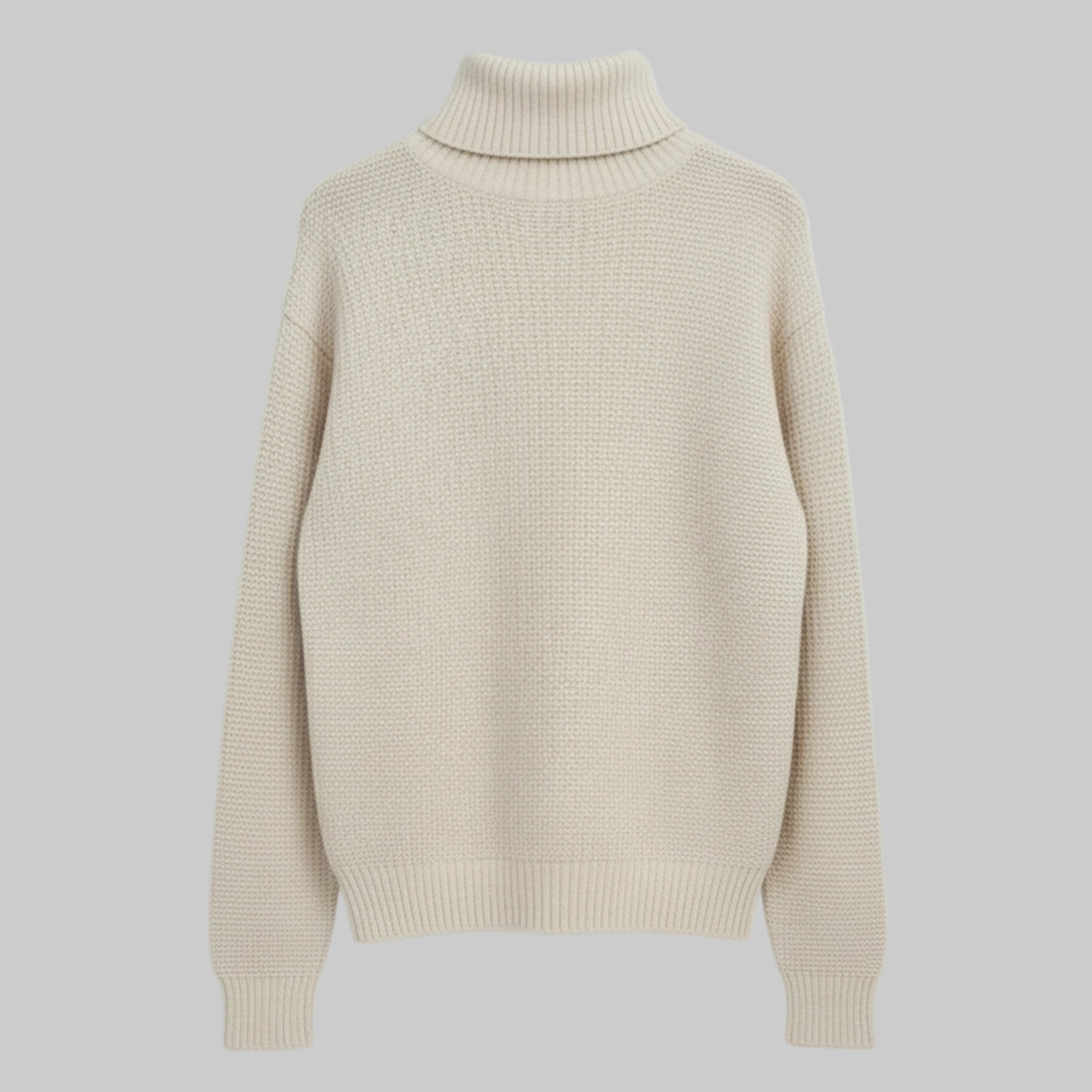 Beige turtleneck sweater on a light gray background