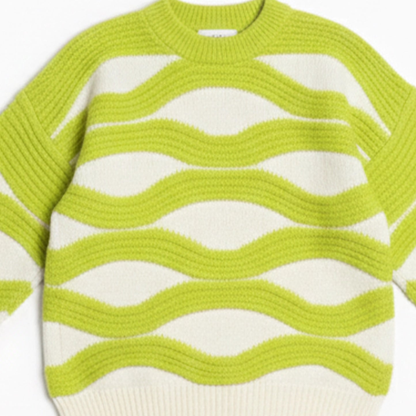Green and white striped sweater on a white background