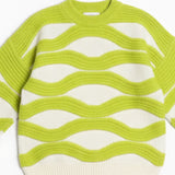 Green and white striped sweater on a white background