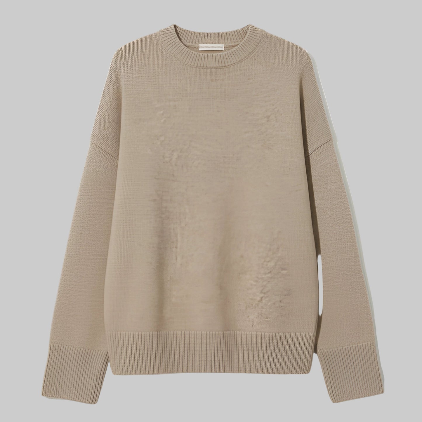 Beige sweater on a light beige background