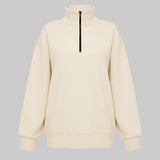 Beige half-zip sweatshirt on a white background