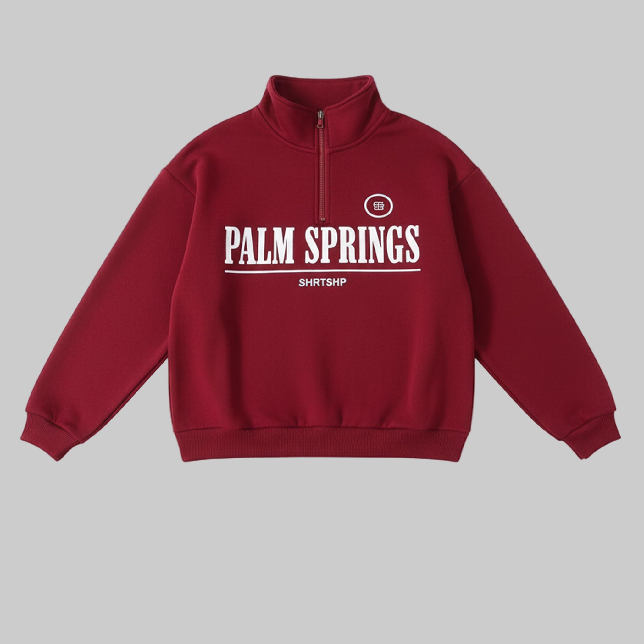 Red sweatshirt with 'Palm Springs' text on a white background