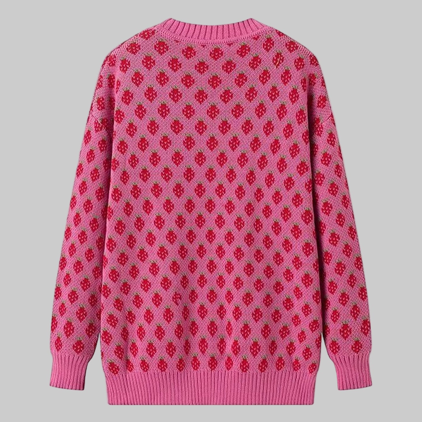 Pink sweater with red pattern on a white background