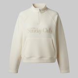 Beige half-zip sweatshirt with 'Lounge Sunday Club' text on a light gray background