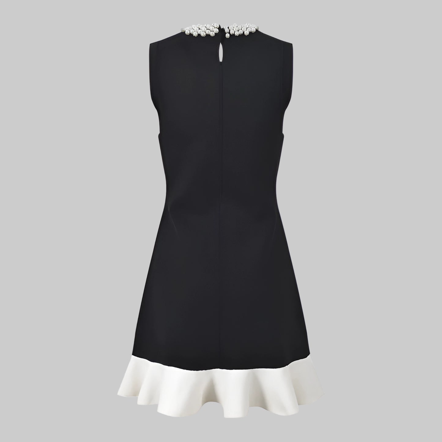 Black dress with white trim on a white background