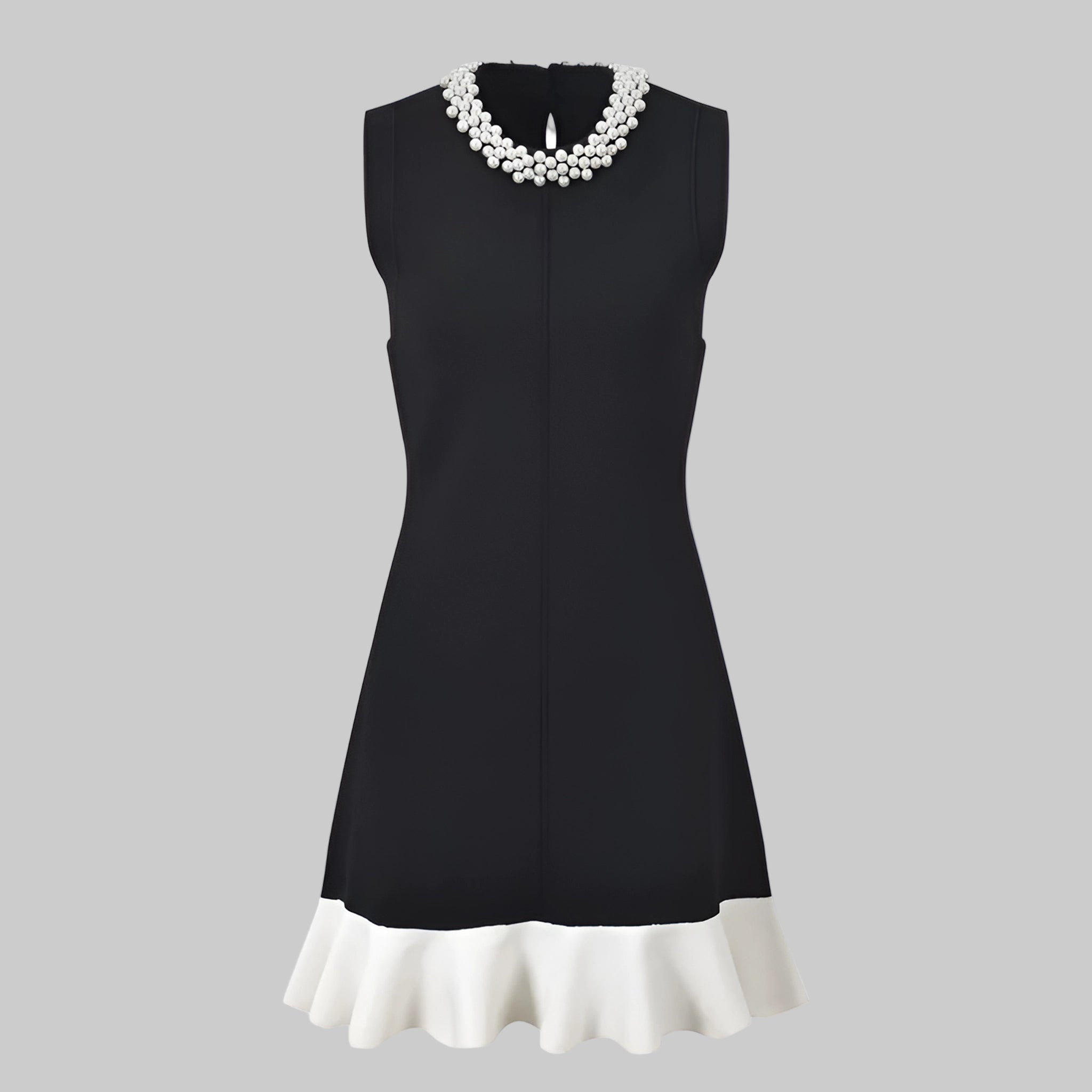Black dress with white trim on a white background