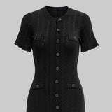 Black dress on a gray background