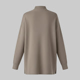 Beige sweater on a white background