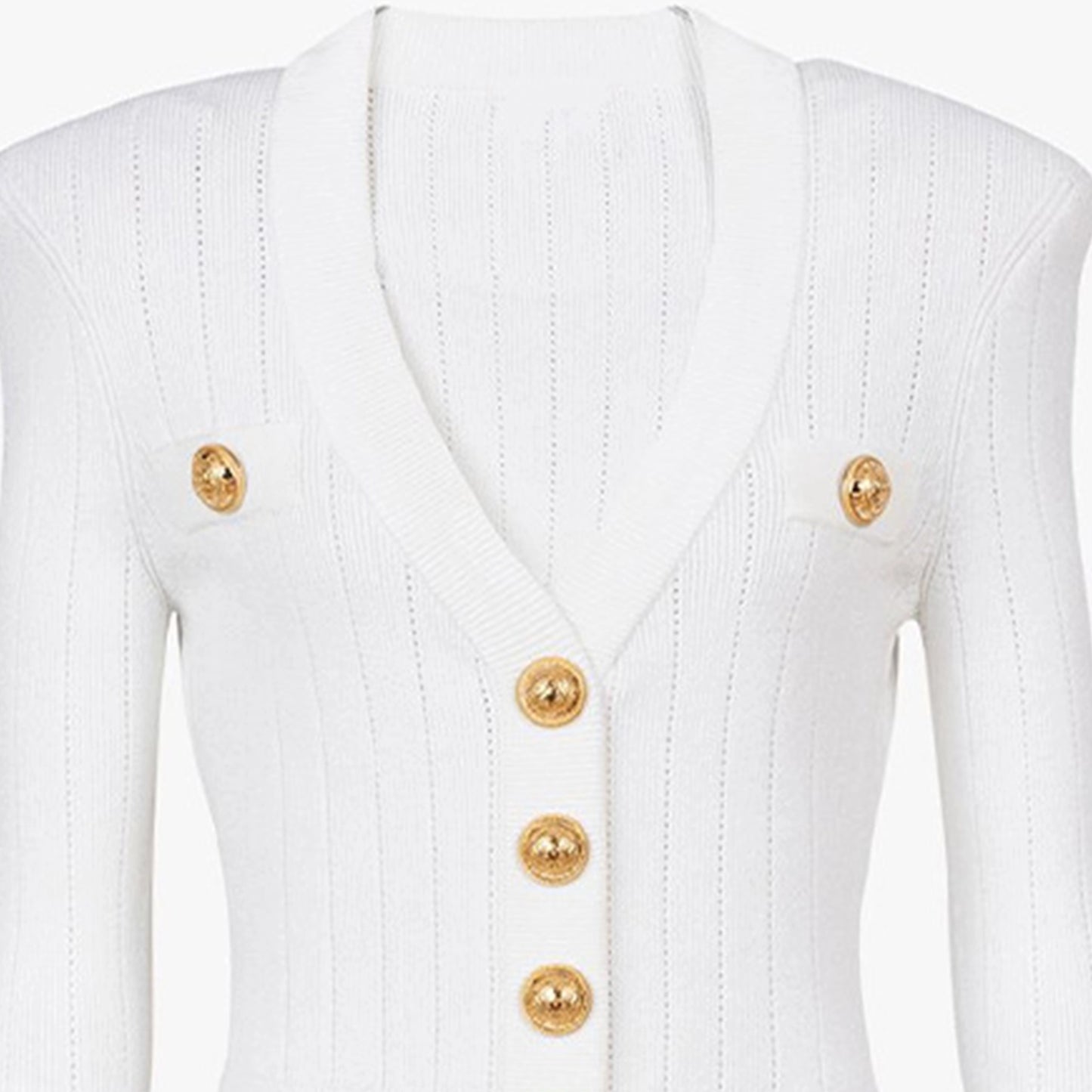 White garment with gold buttons on a white background