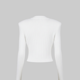 White sleeveless top on a light gray background