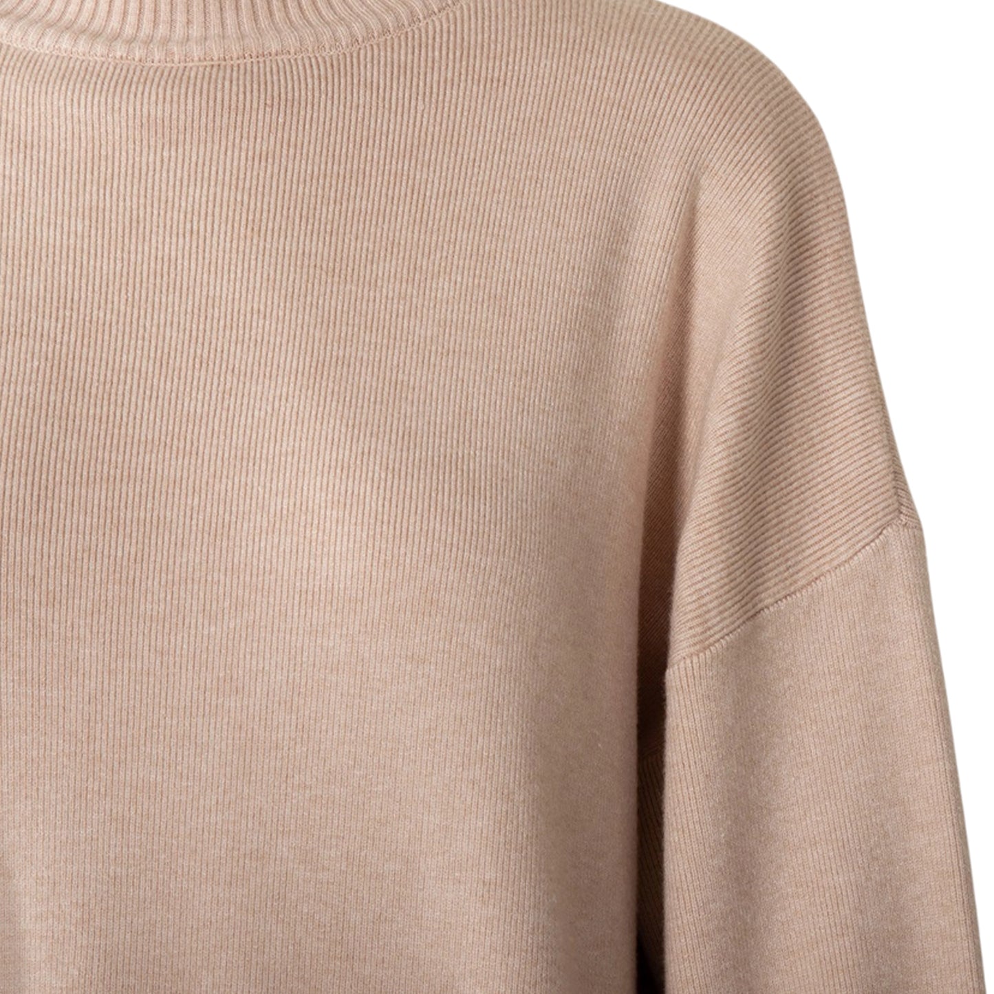 Close-up of a beige sweater sleeve on a white background