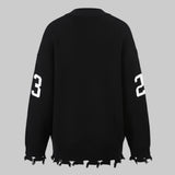 Black sweater with white numbers on a white background