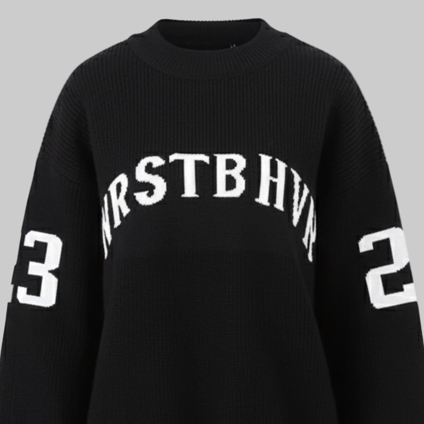 Black sweater with white text and numbers on a white background