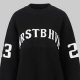 Black sweater with white text and numbers on a white background